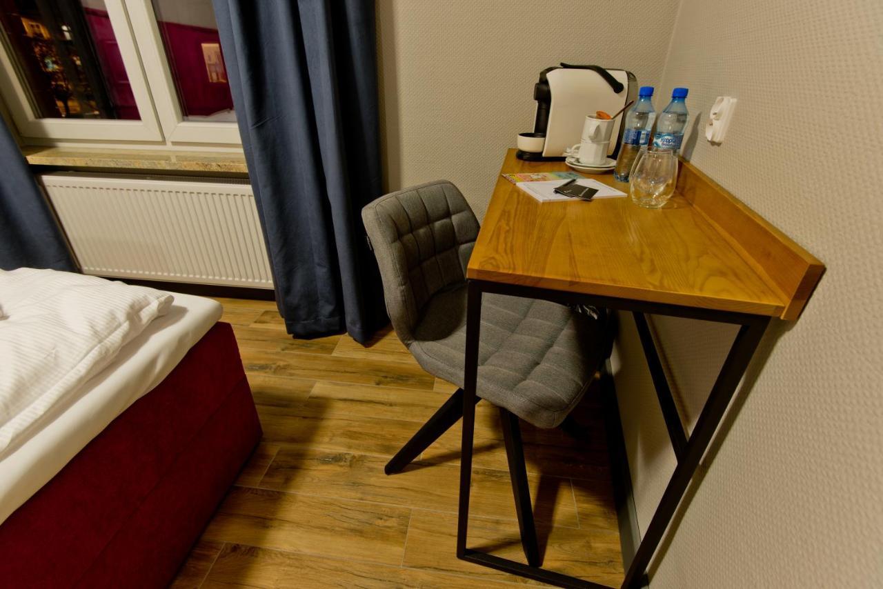 Apartsuites I Sorau Żary Eksteriør billede A Nespresso machine in a hotel room